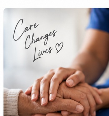 Caregiver gently holding a client’s hands